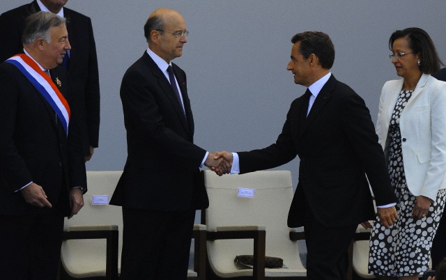4 July 2011, Paris, France --- Former French Foreign Minister Alain Juppé and former French President Nicolas Sarkozy --- Image by © Neil Marchand/Liewig Media Sports/Corbis
