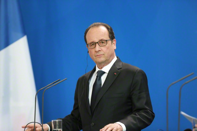 19 May 2015, Berlin, Germany --- Berlin, Germany. 19th May 2015 -- French President Francois Hollande during a joint press conference with German Chancellor Angela Merkel at the Federal Chancellery in Berlin, Germany, 19 May 2015. Image by © Simone Kuhlmey/Demotix/Corbis