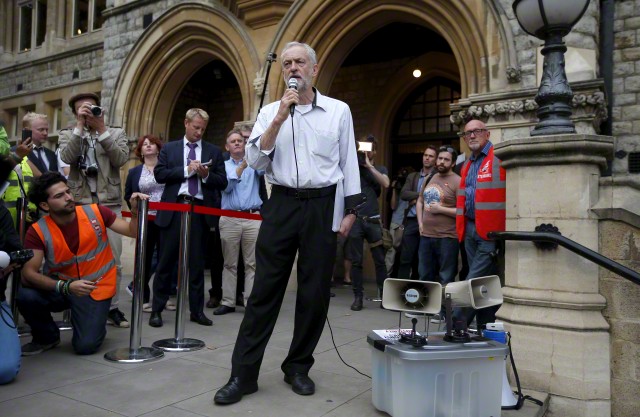 17 Aug 2015, London, England, UK --- Labour Party leadership candidate Jeremy Corbyn talks to a crowd of supporters unable to enter an election campaigning event at Ealing in west London, Britain August 17, 2015. --- Image by © PETER NICHOLLS/Reuters/Corbis